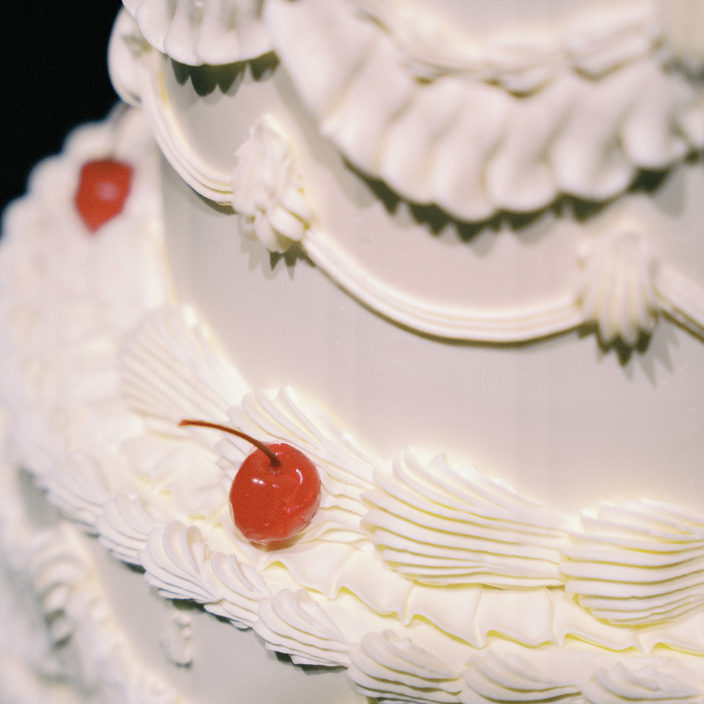 Closeup image of a wedding cake at reception